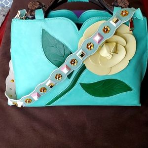 Turquoise leather purse with embellished strap